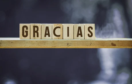Tiles with letters spelling out the word "gracias"